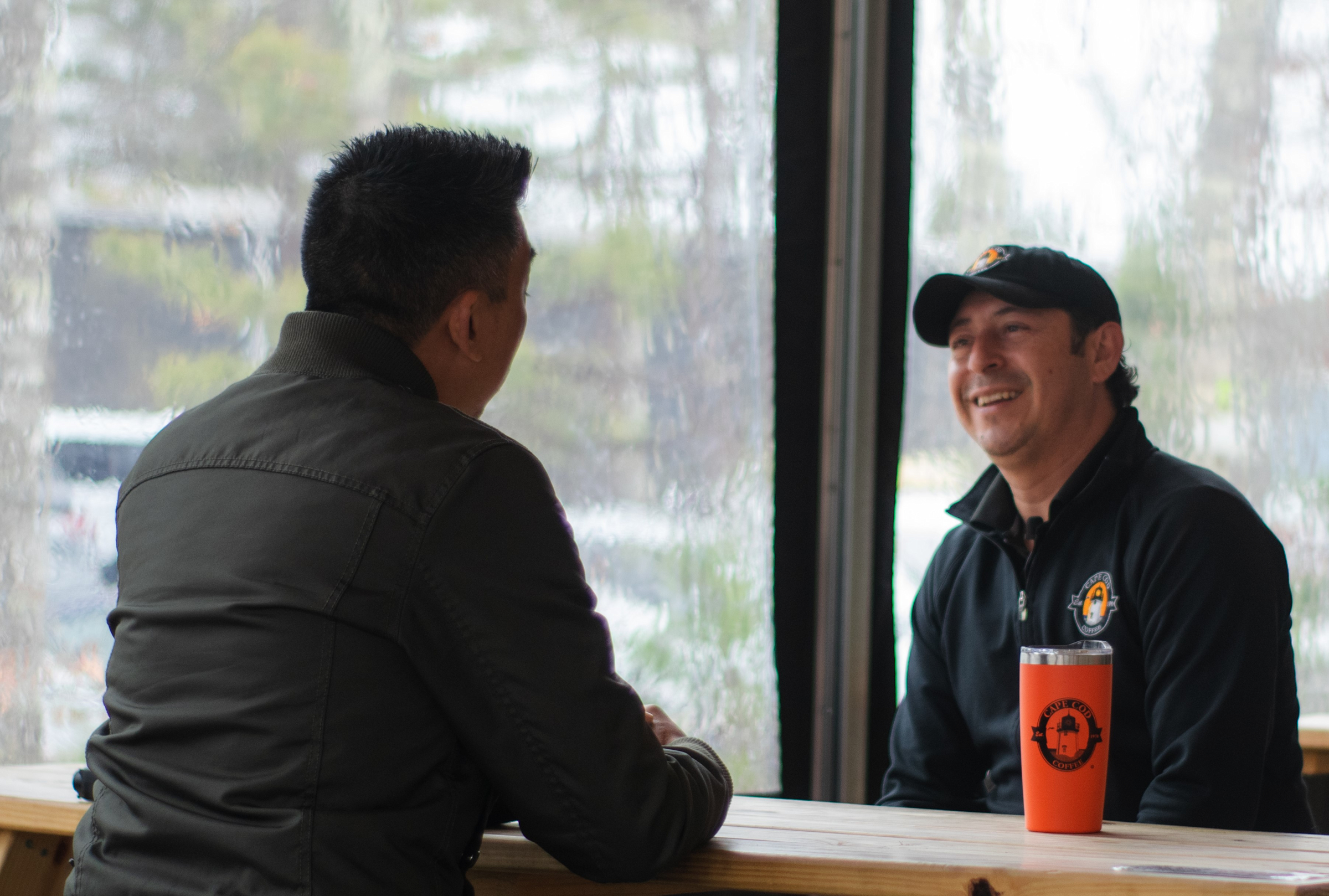 Coffee Director Marc Marquez talks with Luis Sierra, Head Roaster of Cape Cod Coffee (MA)