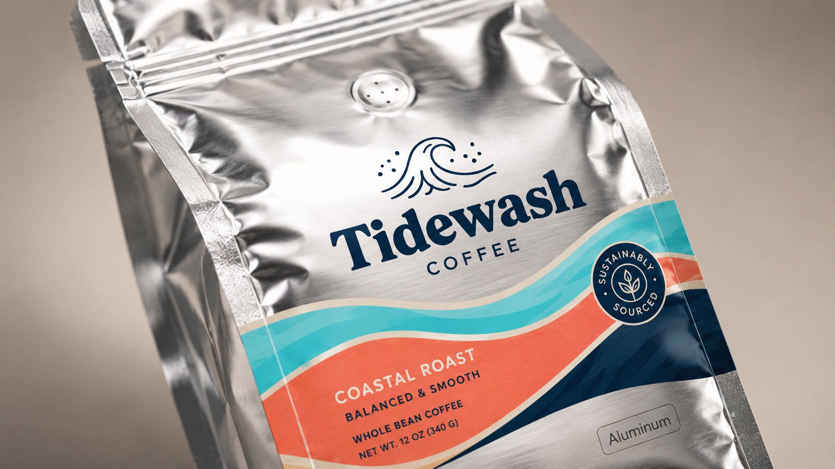 Macro close-up of a glossy aluminum high-barrier coffee bag with a crisp seal, the bag material that stays stable and effectively never expires in normal storage