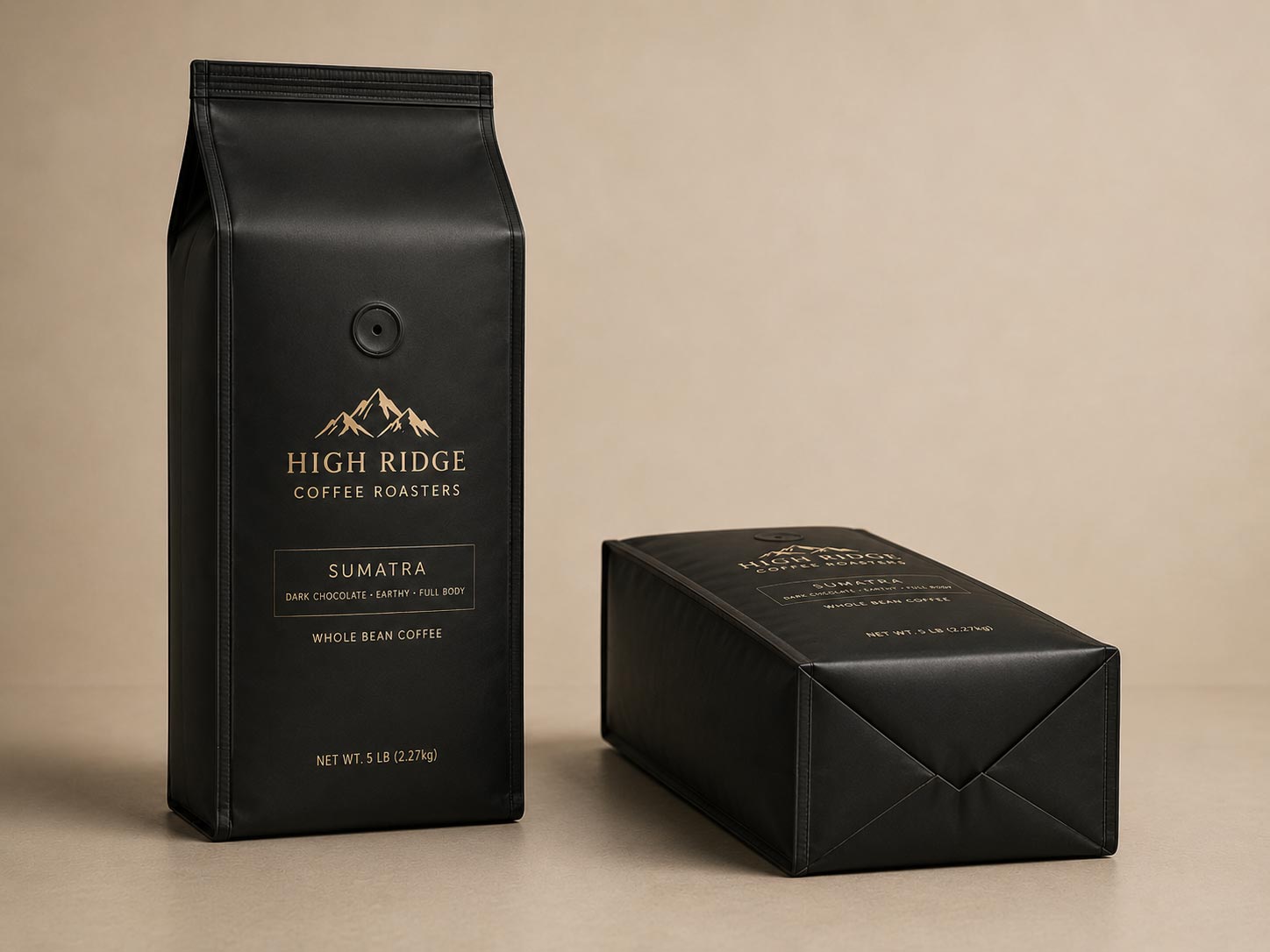 A quad seal V cut coffee bag standing upright with a detail view of the V shaped fold at the bottom of the bag