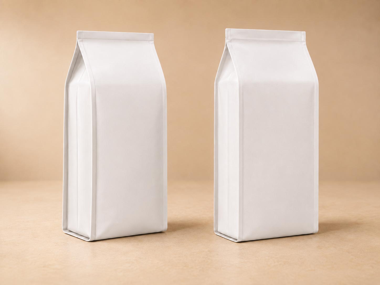 A side gusset V cut coffee bag with the folded pleat visible down the side and a detail view of the V shaped bottom